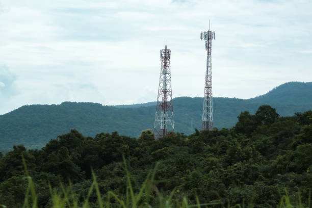 istock High-voltage pylons on the mountain road. 1018276428