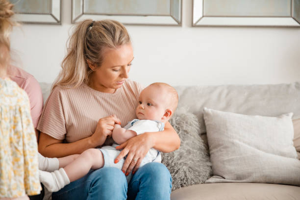 istock Mother Holding Her Baby Boy 1018277384
