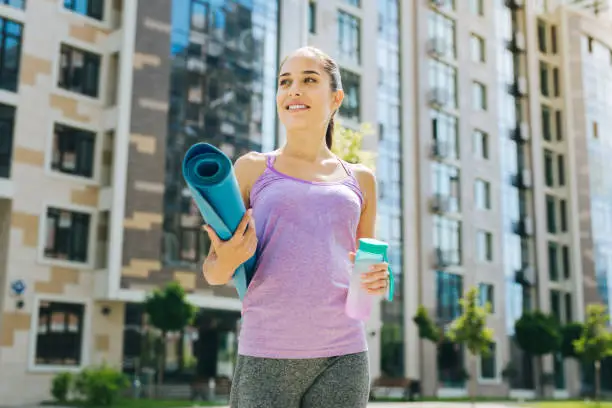 Photo of Positive fit woman smiling