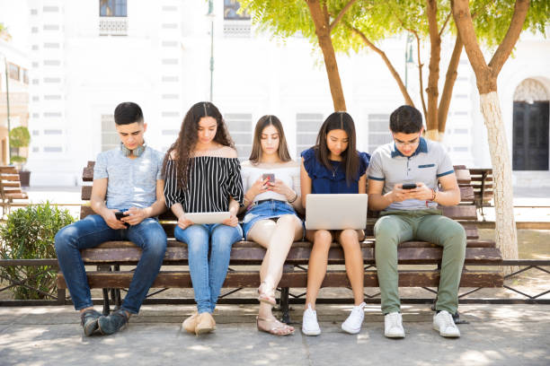 istock Friends social networking outdoors 1018281988