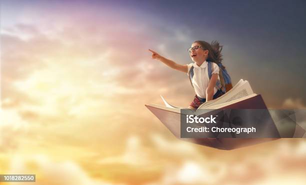 Child Flying On The Book Stock Photo - Download Image Now - Child, Book, Flying