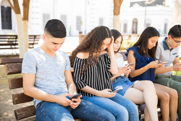 istock Teenager social networking with tech devices 1018286588