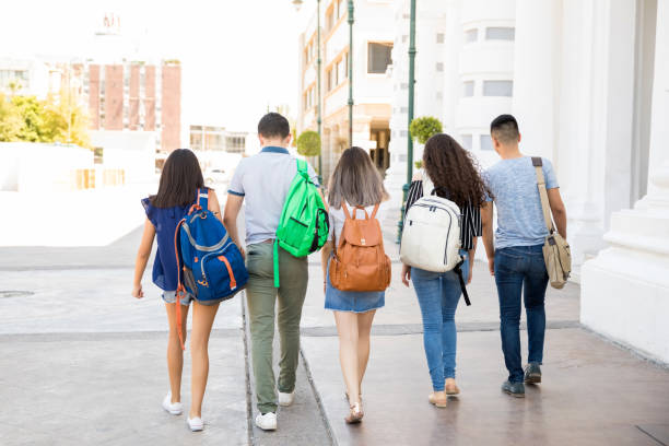 istock Teenagers going to school 1018286826