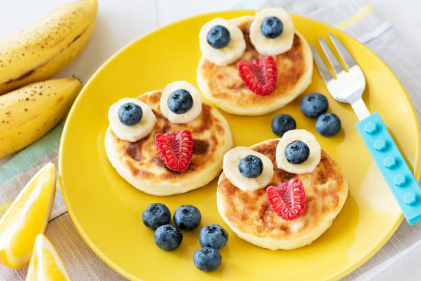 Funny Healthy Breakfast For Kids. Colorful Children Food Menu Funny Healthy Breakfast For Kids. Colorful Children Food Menu On Yellow Plate bunny pancake stock pictures, royalty-free photos & images