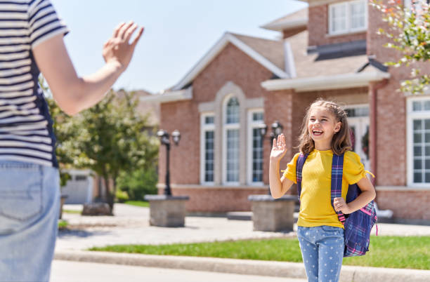 istock Parent and pupil go to school 1018291086
