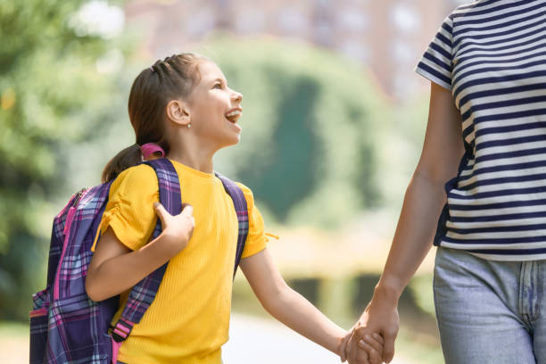 istock Parent and pupil go to school 1018291188