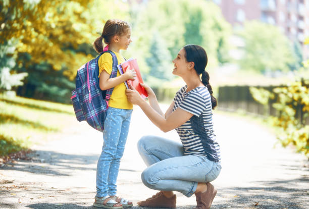 istock Parent and pupil go to school 1018291202