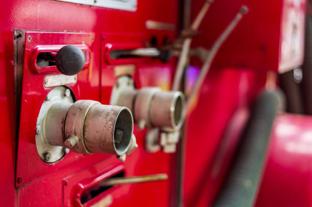 istock closeup pipe hydrant on a fire truck with soft-focus and over light in the background 1018314726