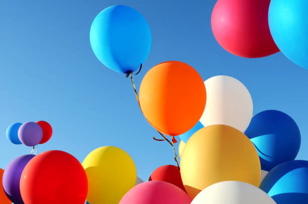 multicolored balloons in the city festival stock photo