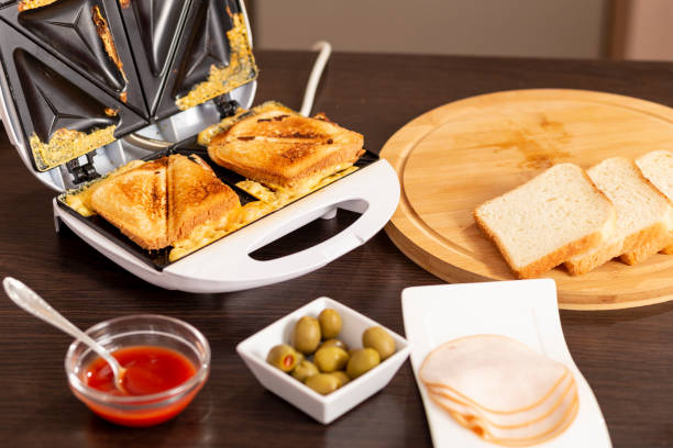 istock Hot sandwiches in a sandwich maker 1018318190