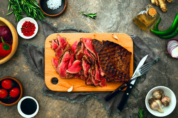 Grilled skirt steak served on a cutting board