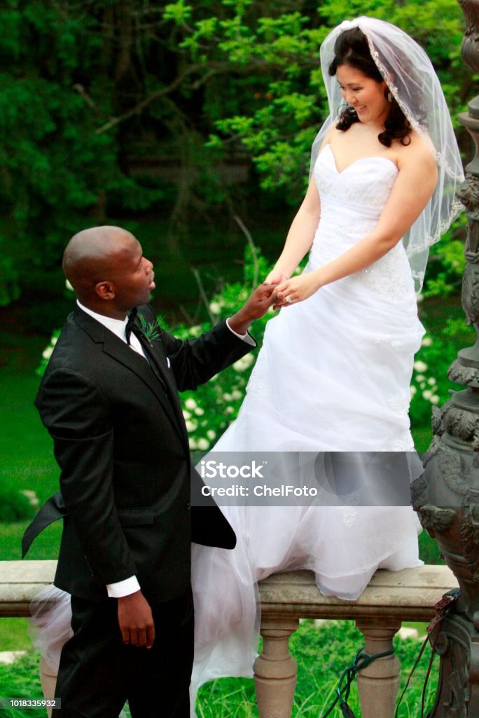 Kristin & David's Special Day A very special inter-racial couple celebrate their love on their wedding day. Adult Stock Photo