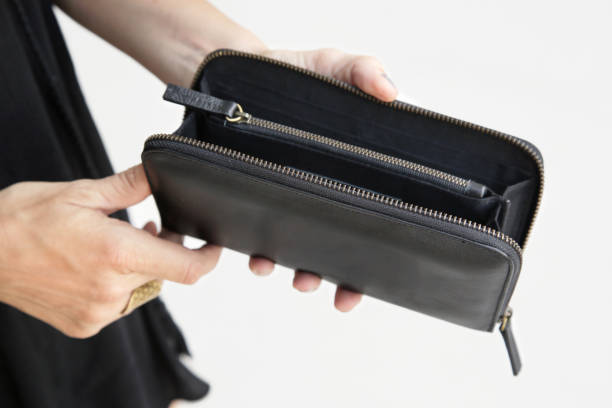 istock Open wallet with no money, black leather simple pouch 1018336998