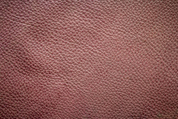 istock Old and dirty brown leather texture background 1018340498