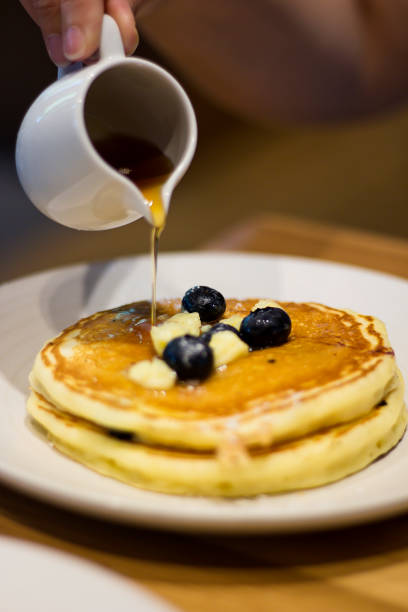 istock Buttermilk Pancakes and Poured Maple Syrup 1018350212