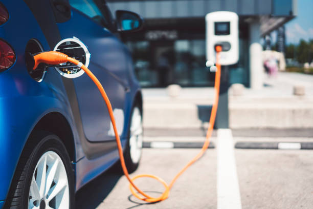 Electric car Electric car in the city hybrid car photos stock pictures, royalty-free photos & images
