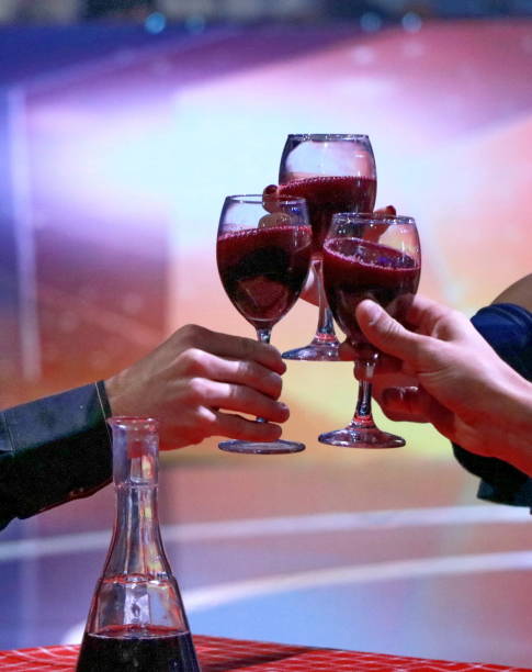 istock Group of happy friends drinking red wine 1018354850