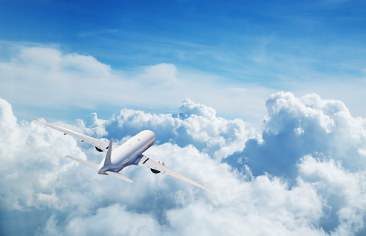 Airplane wing and blue sky view. Travel Concept.