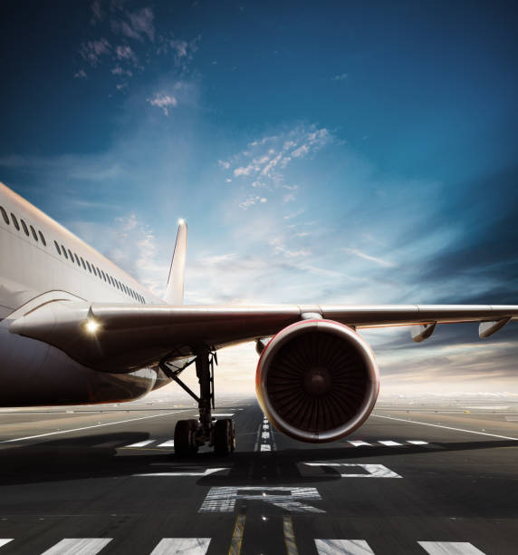 istock Commercial airplane on runway in day light. 1018355086