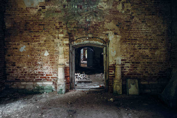 istock Inside ancient ruined medieval brick temple interior with arches and corridors 1018355592