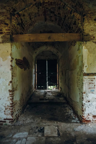 istock Inside ancient ruined medieval brick temple interior with arches and corridors 1018355600