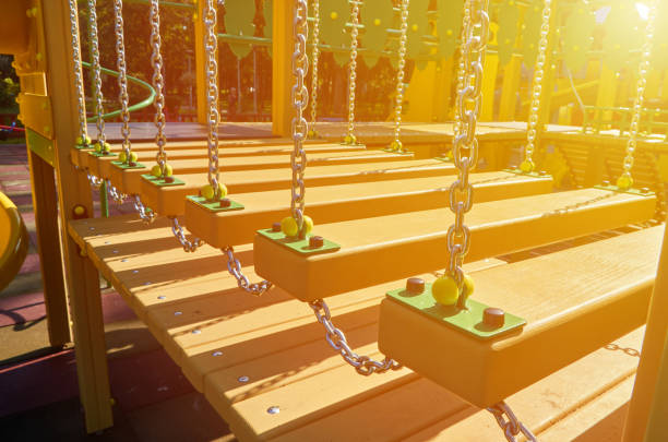 staggering steps for children in the public playground, sunlight effect.