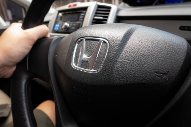 Honda Freed Black Steering Wheel with Honda logo. stock photo
