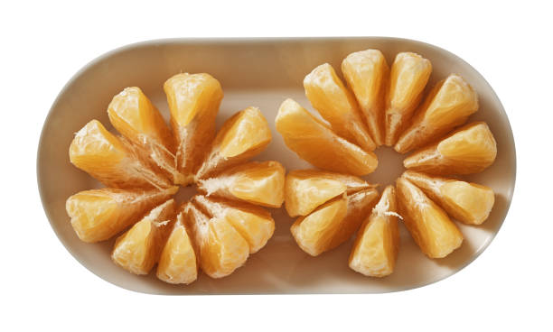 istock Tangerine on plate. Preparing ingredients for cooking. Isolated on white background. Top view. 1018378784