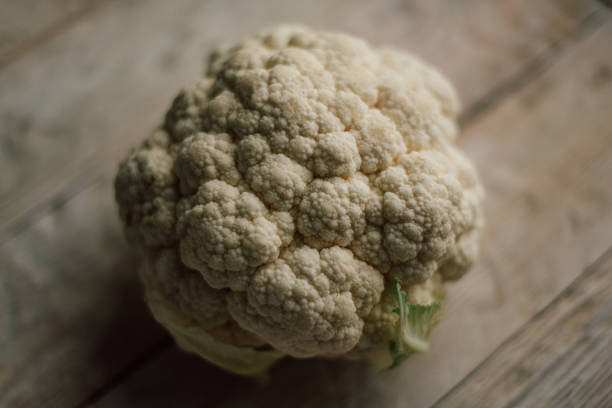 istock fresh cauliflower on the table, healthy food 1018384620