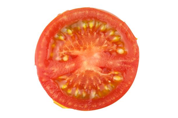 istock Tomato slice isolated on white background, top view. Fresh home-made vegetables. Growing tomatoes. Preparation of vegetable salad. Vegetarian food. 1018400818