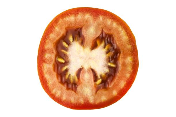istock Tomato slice isolated on white background, top view. Fresh home-made vegetables. Growing tomatoes. Preparation of vegetable salad. Vegetarian food. 1018400858