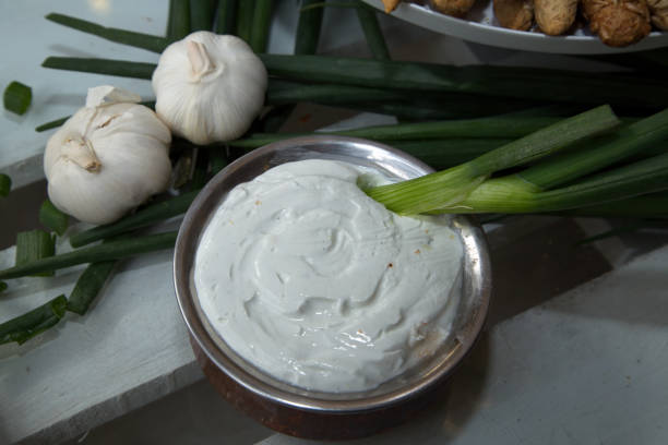 istock Green onion, garlic and sour cream dip 1018410544