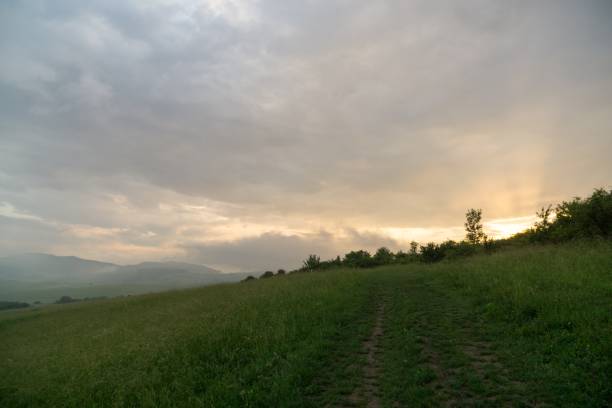istock Sunrise and sunset over the hills and town. 1018416254