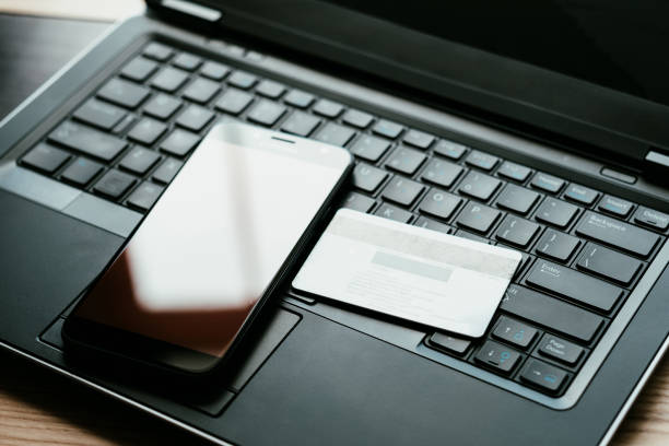 istock mobile commerce business online laptop phone card 1018417280