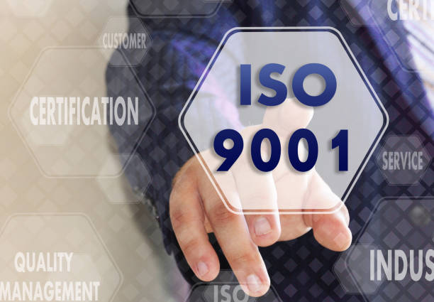 istock The businessman chooses ISO 9001,  presses a button on the touch screen 1018425148