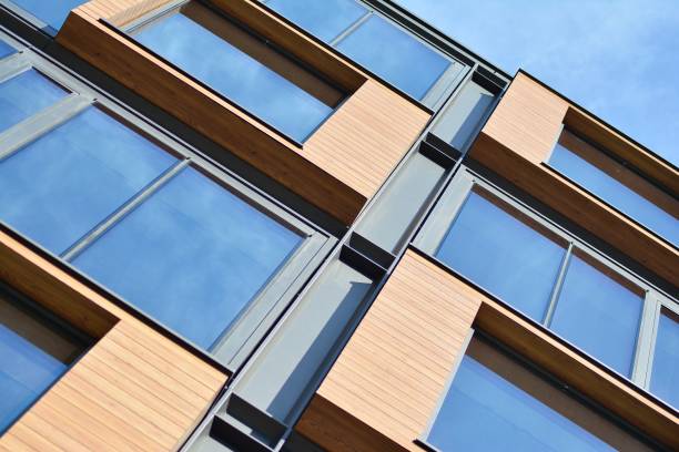 istock Blue clean glass wall of modern office building 1018442772