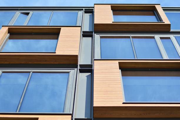 istock Blue clean glass wall of modern office building 1018444894