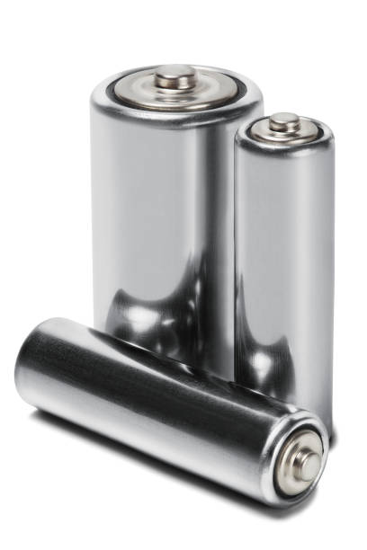 istock Three batteries AAA, AA and PP3 on white isolated background. Concept of renewable energy and sources of electrical power. Pattern for designer of environmental power sources, electrical power sources. 1018445662