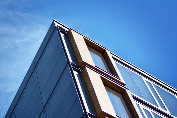 istock Blue clean glass wall of modern office building 1018446466