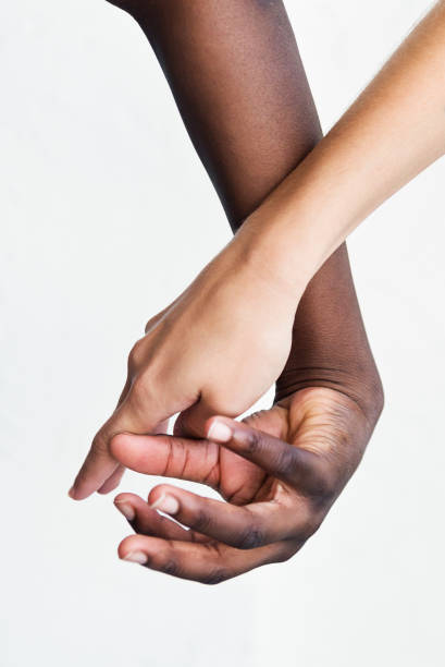 istock Hands with different skin colors on white background. 1018450782