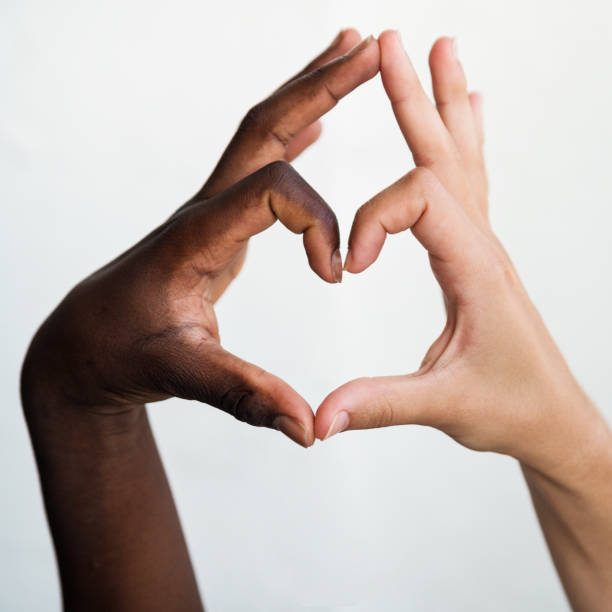 istock Hands with different skin colors on white background. 1018450898