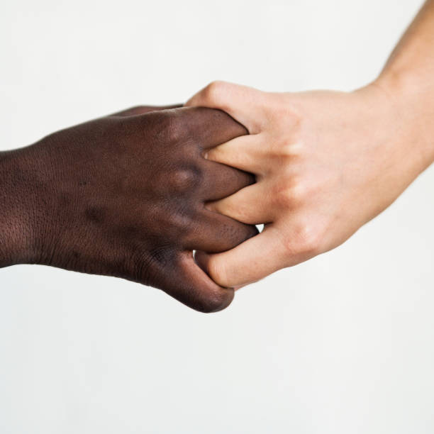 istock Hands with different skin colors on white background. 1018450970