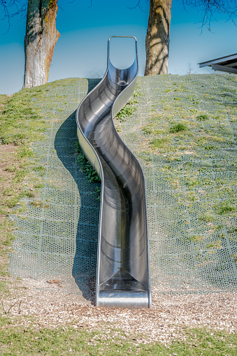 Long metal slide on playground