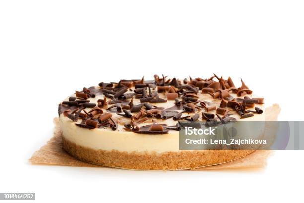 Caramel Cheesecake With Chocolate Flakes Isolated On White Stock Photo - Download Image Now