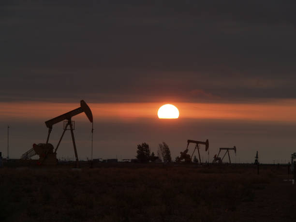 Pump Jack sunrise stock photo