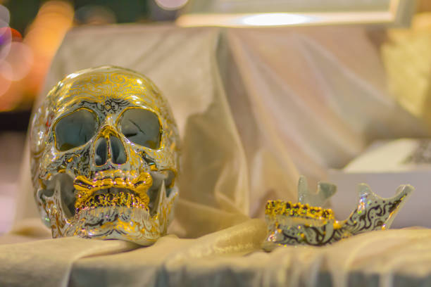 istock Beautiful traditional Thai style patterned on the skull made from ceramic for sale in the street market. Decorated skull ceramics death symbol in Thai style pattern. 1018475144