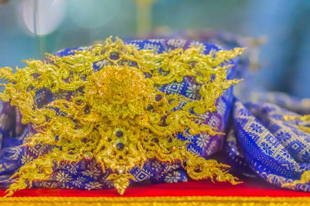 istock Beautiful Thai style golden necklace with multi colored gem stones. 1018477570