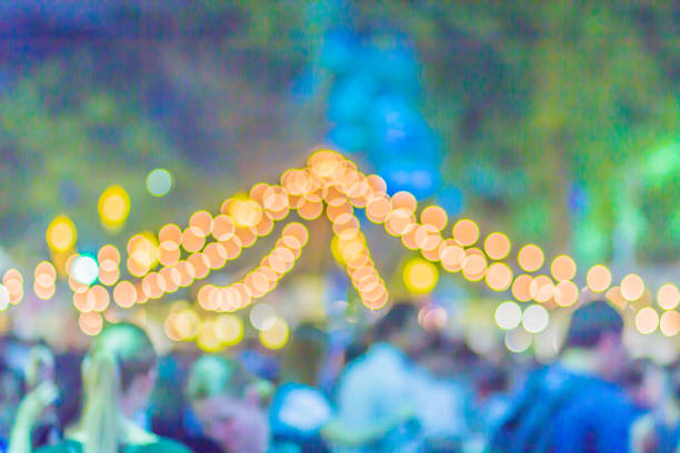 istock Abstract blurred circular bokeh background. Defocused background with bokeh of LED light decoration during Christmas and new year festival. 1018496122