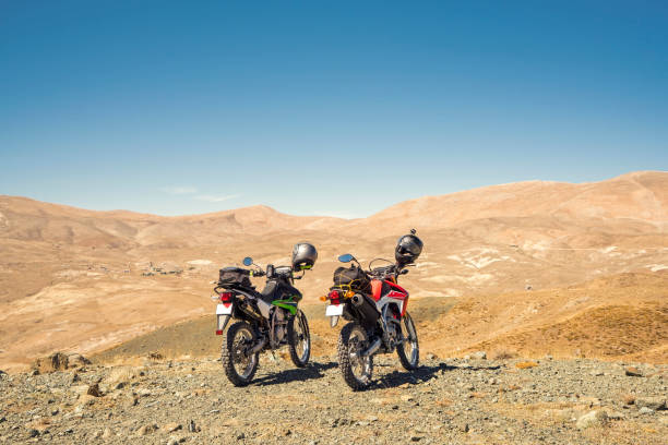 istock Enduro Motorcycles on the mountain road 1018496316