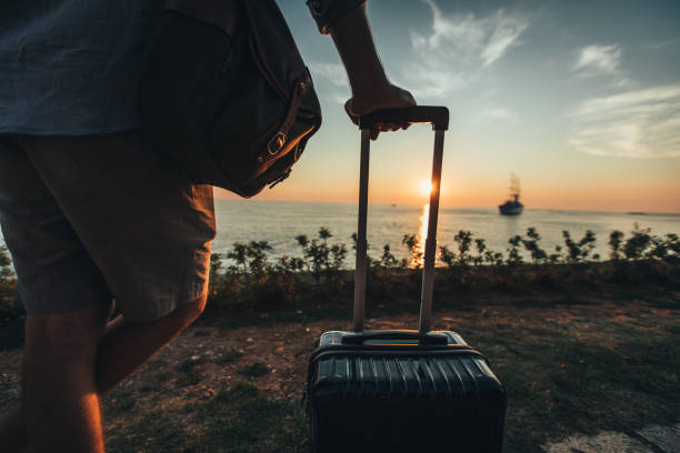 istock Man enjoying by the sea 1018514322